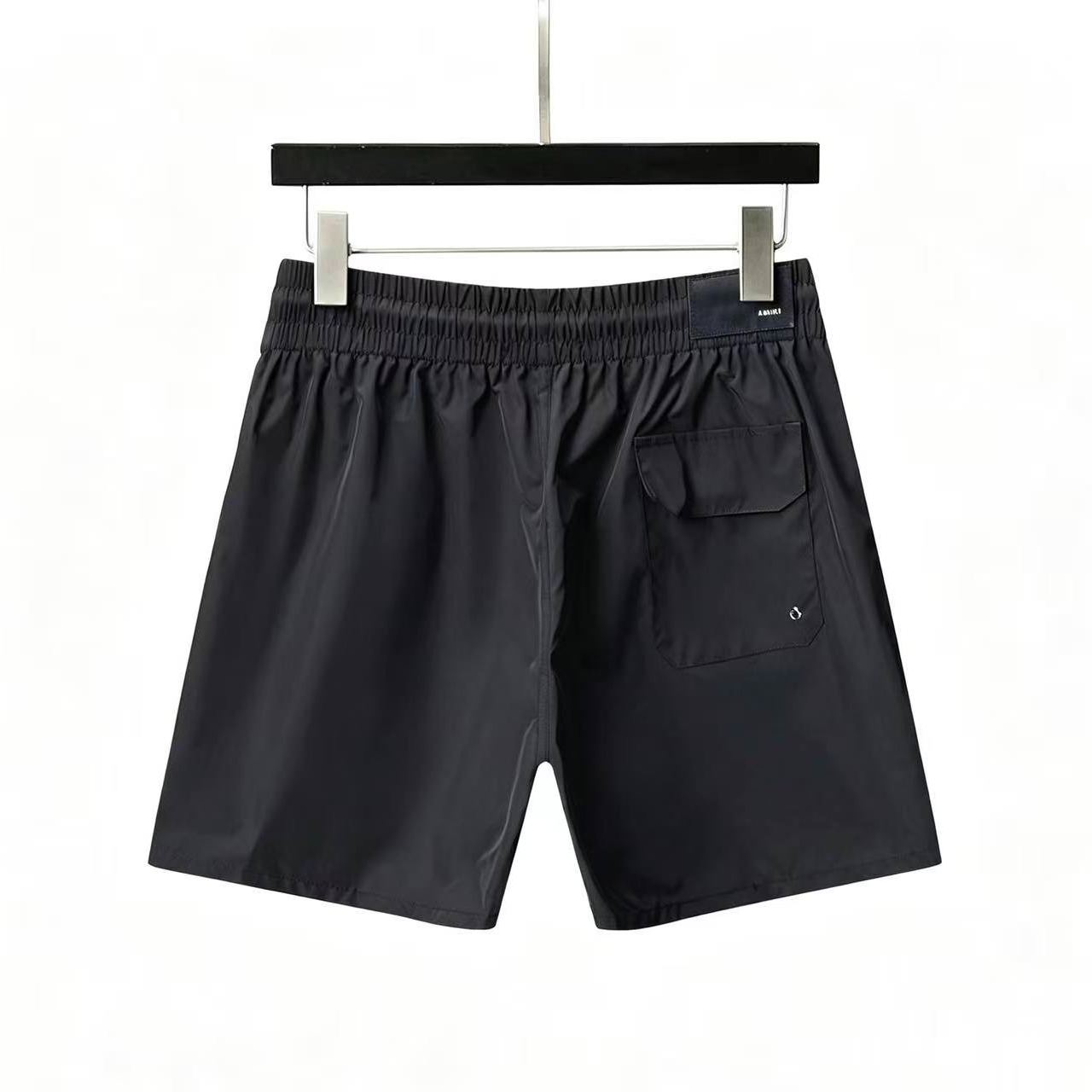 AMIRI MA Core logo printed swim trunks