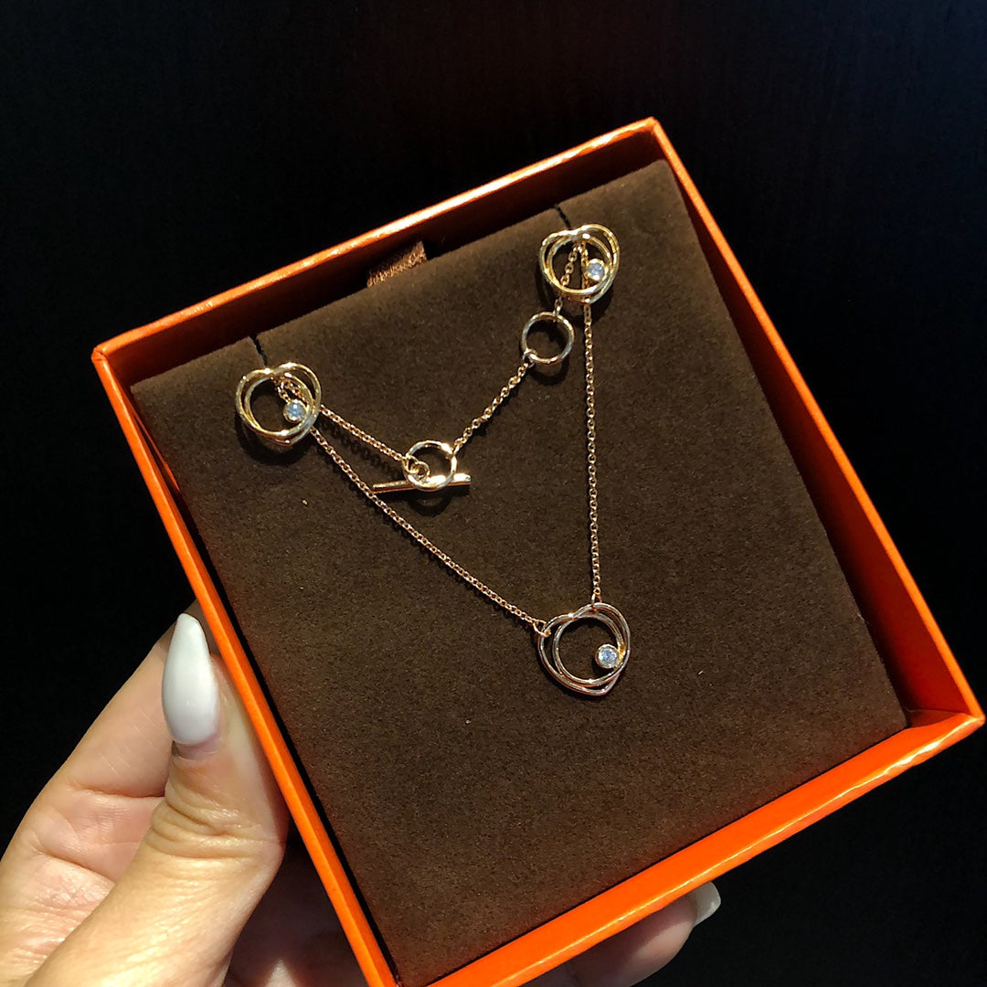 Hermes Vertige Cœur necklace and earrings