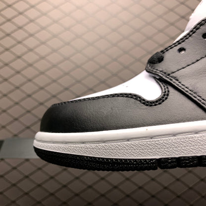 NIKE AIR JORDAN 1 MID "WHITE SHADOW"