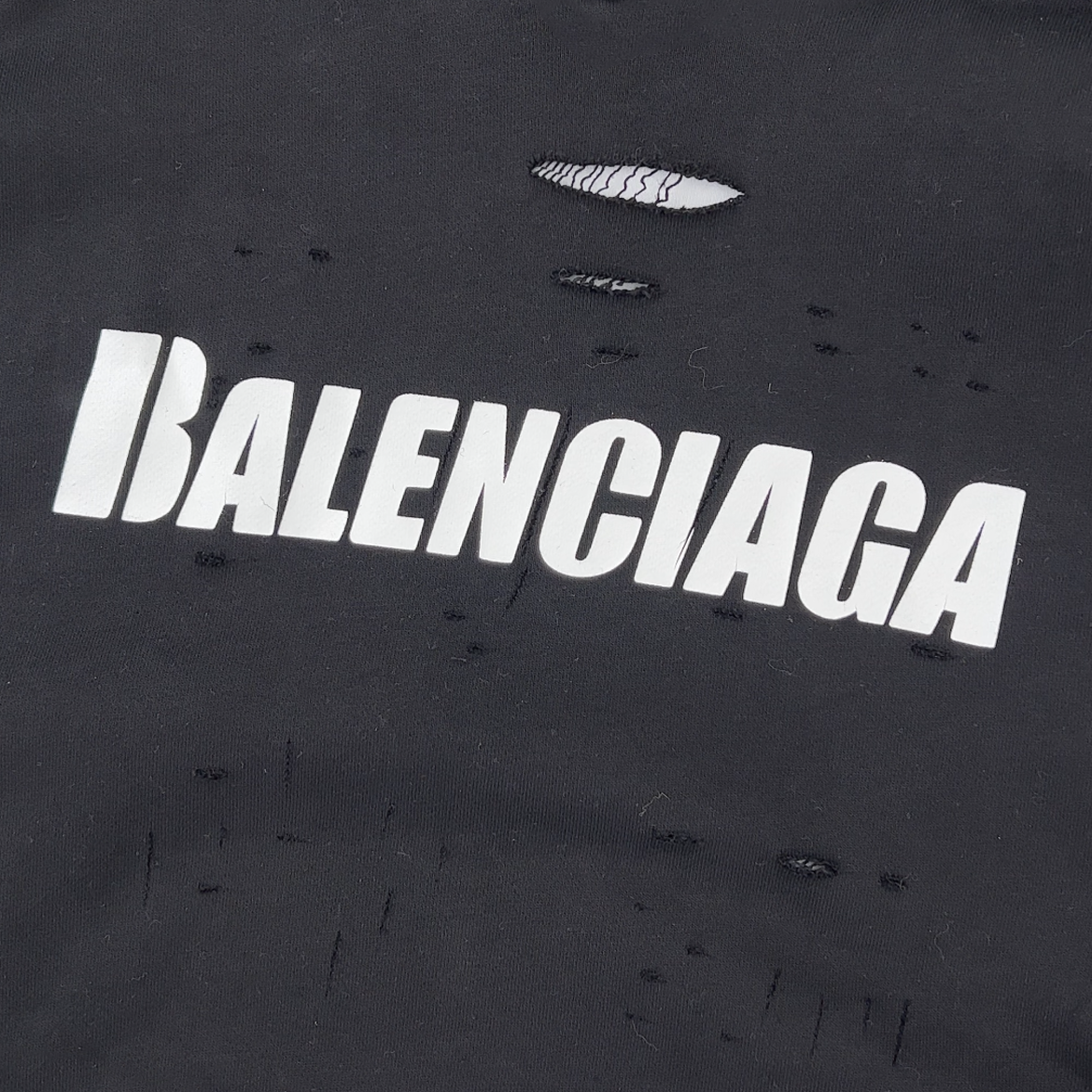 Balenciaga Caps SS22 logo hole-effect fleece sweatshirt