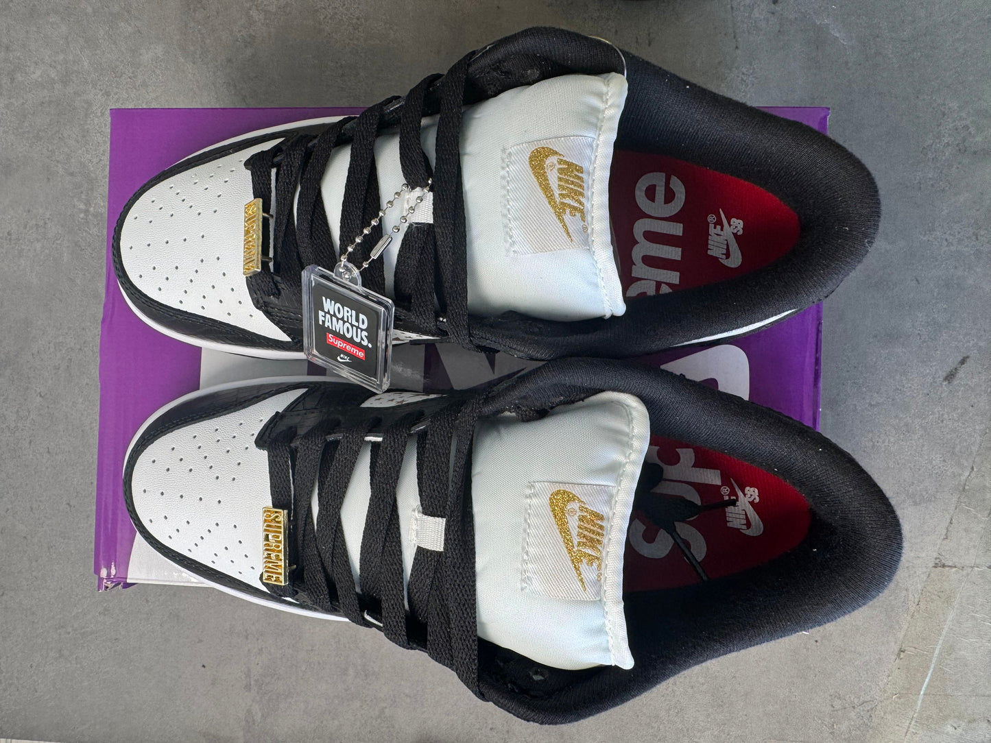 Supreme × Nike SB Dunk Low OG QS "Gold Stars" White/Black