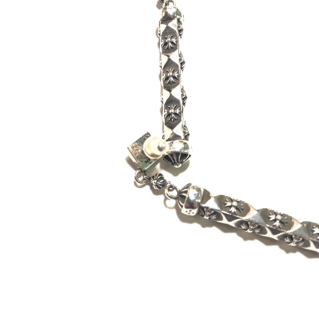 CHROME HEARTS Faceted Cross Cylindrical Earrings
