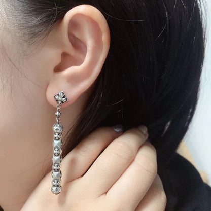CHROME HEARTS Faceted Cross Cylindrical Earrings