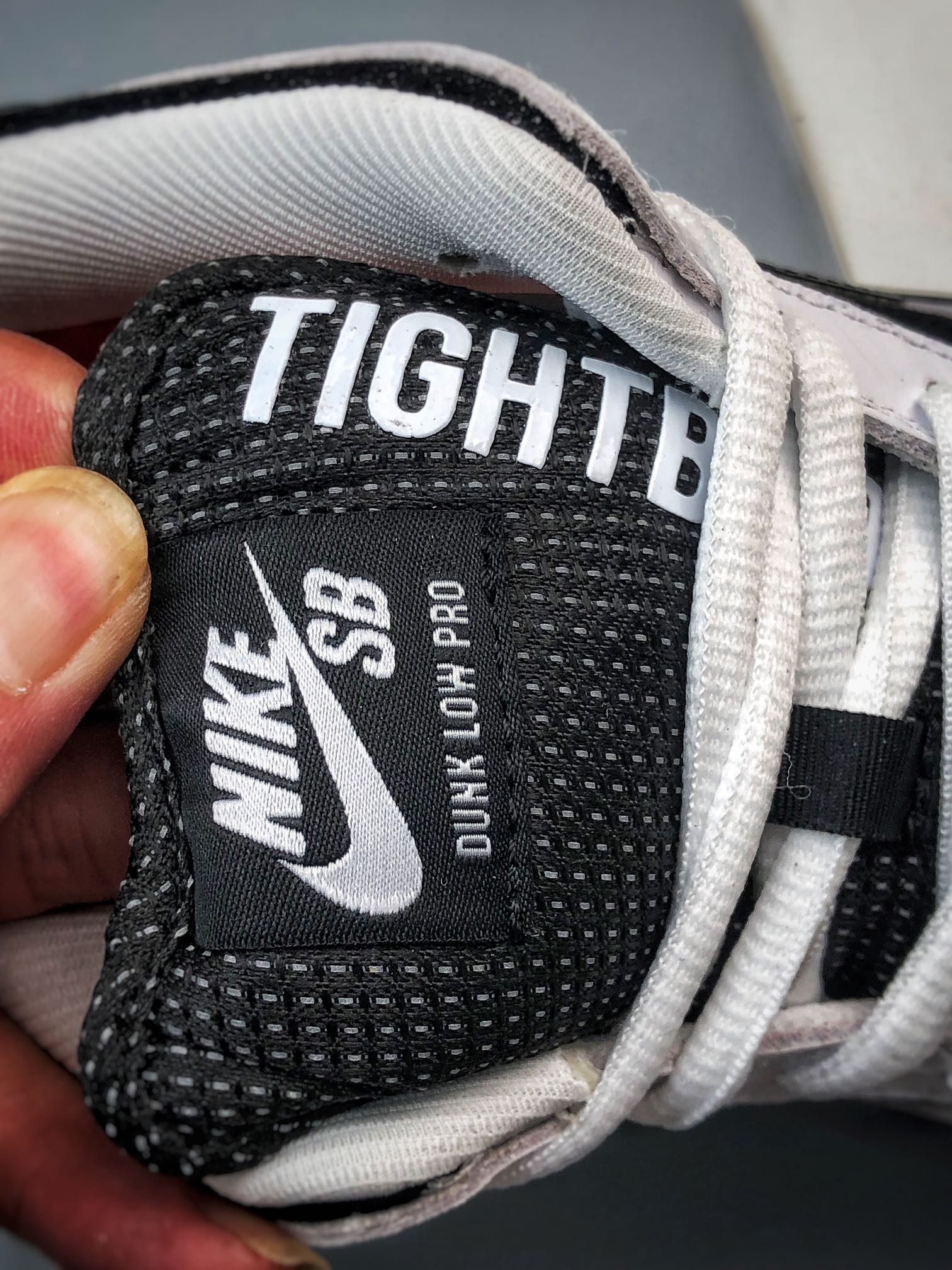 TIGHTBOOTH × Nike SB Dunk Low "White/Black"