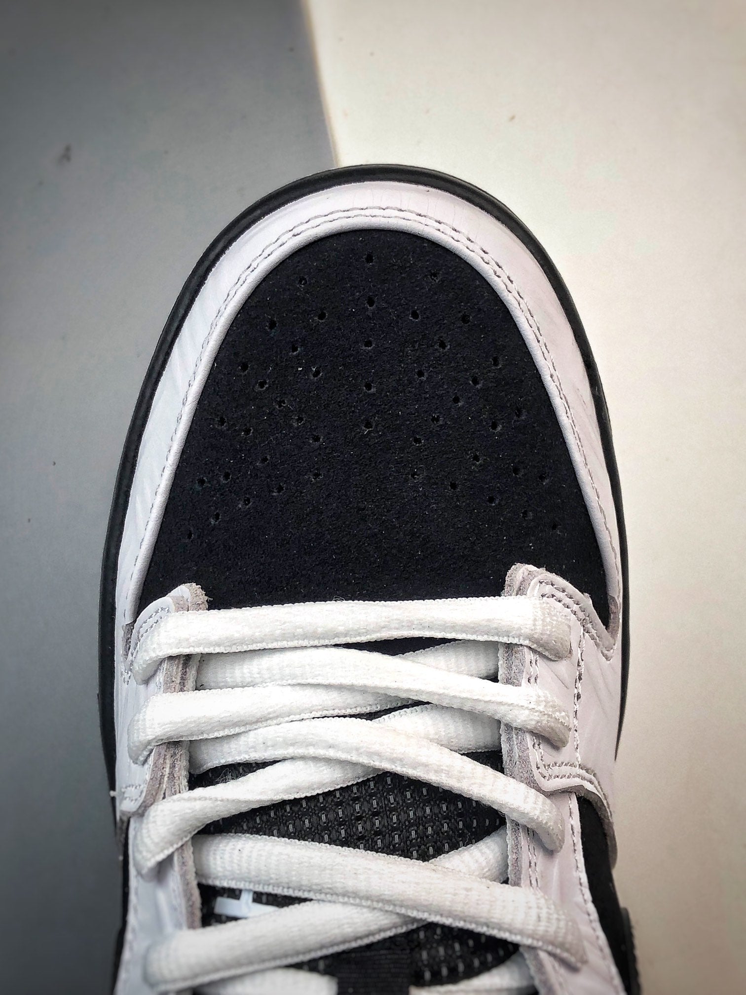 TIGHTBOOTH × Nike SB Dunk Low "White/Black"