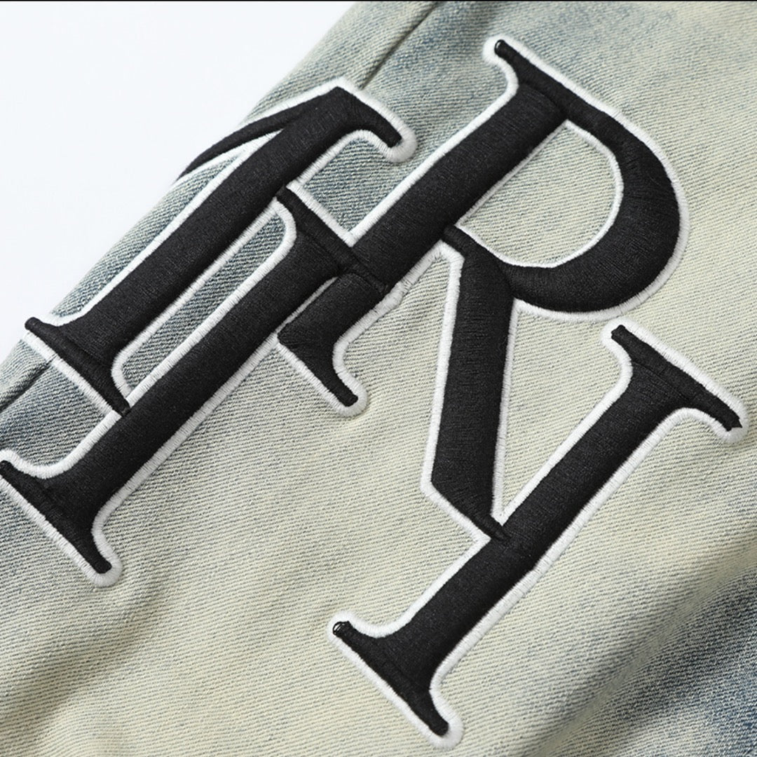 AMIRI Staggered-logo jeans