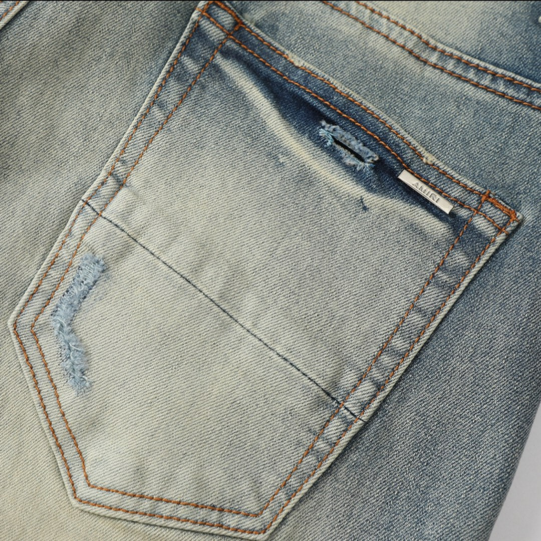 AMIRI Staggered-logo jeans