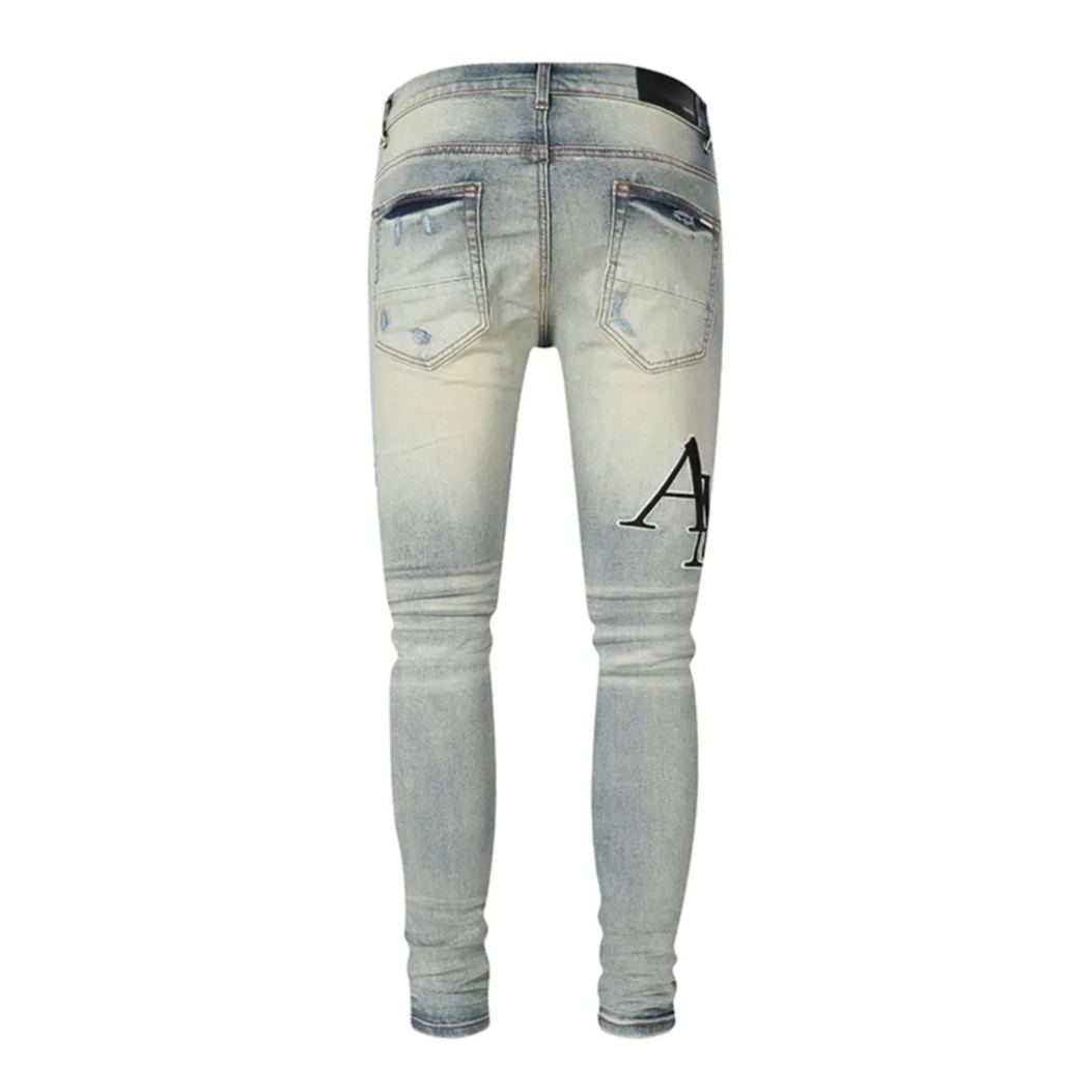 AMIRI Staggered-logo jeans