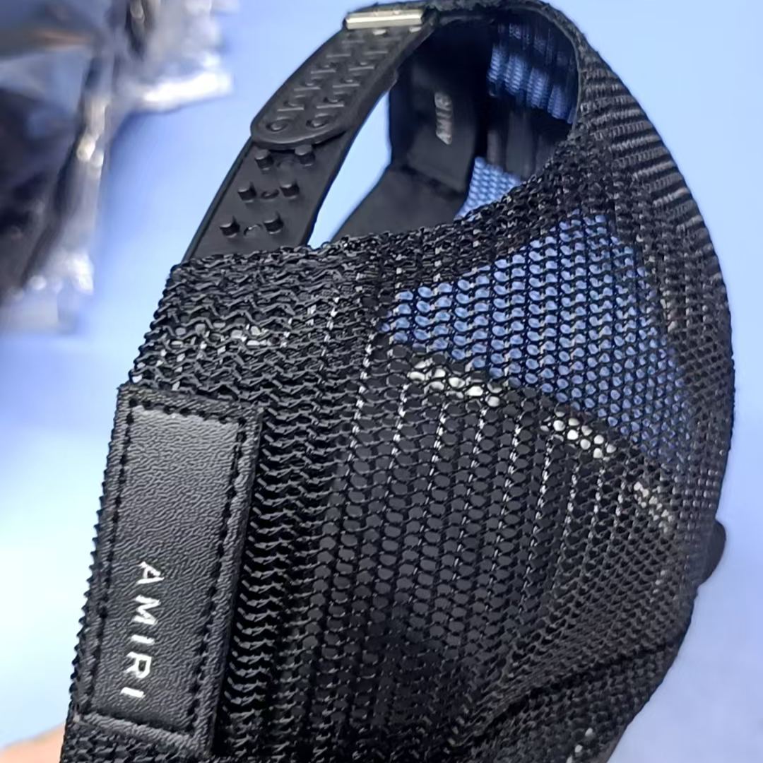 AMIRI ARTS DISTRICT TRUCKER HAT
