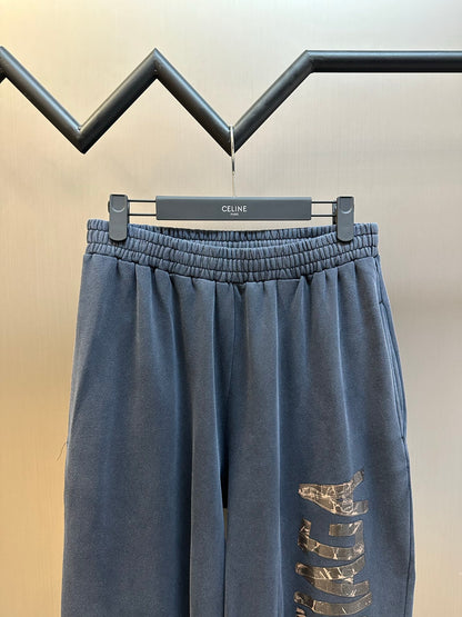 BALENCIAGA Transparent Tape Baggy Pants