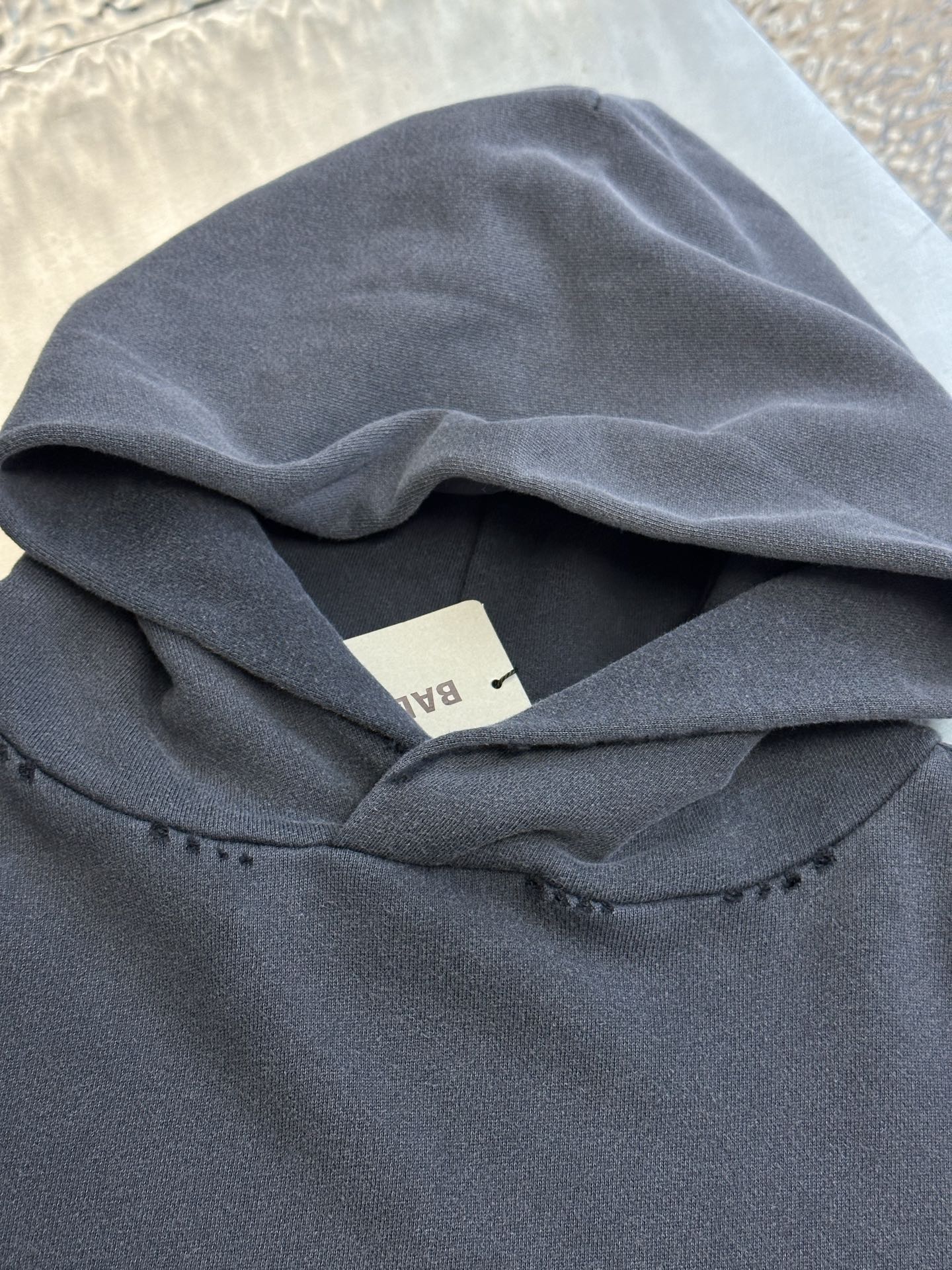 BALENCIAGA Transparent Tape Ripped Pocket Hooded Sweatshirt