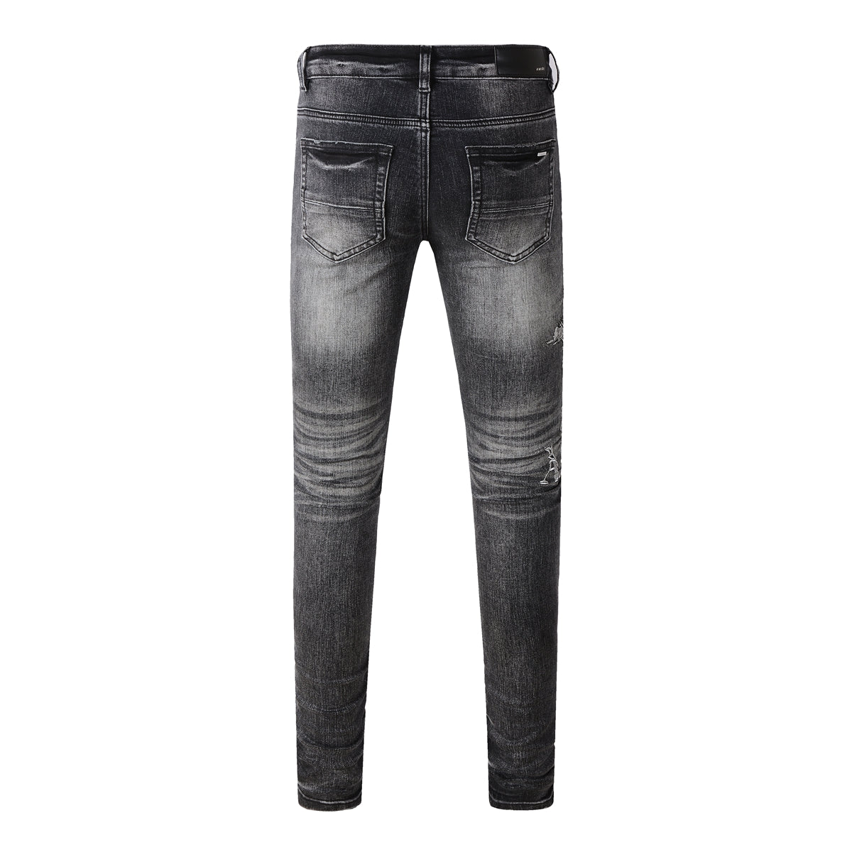 AMIRI Distressed Skinny Jeans