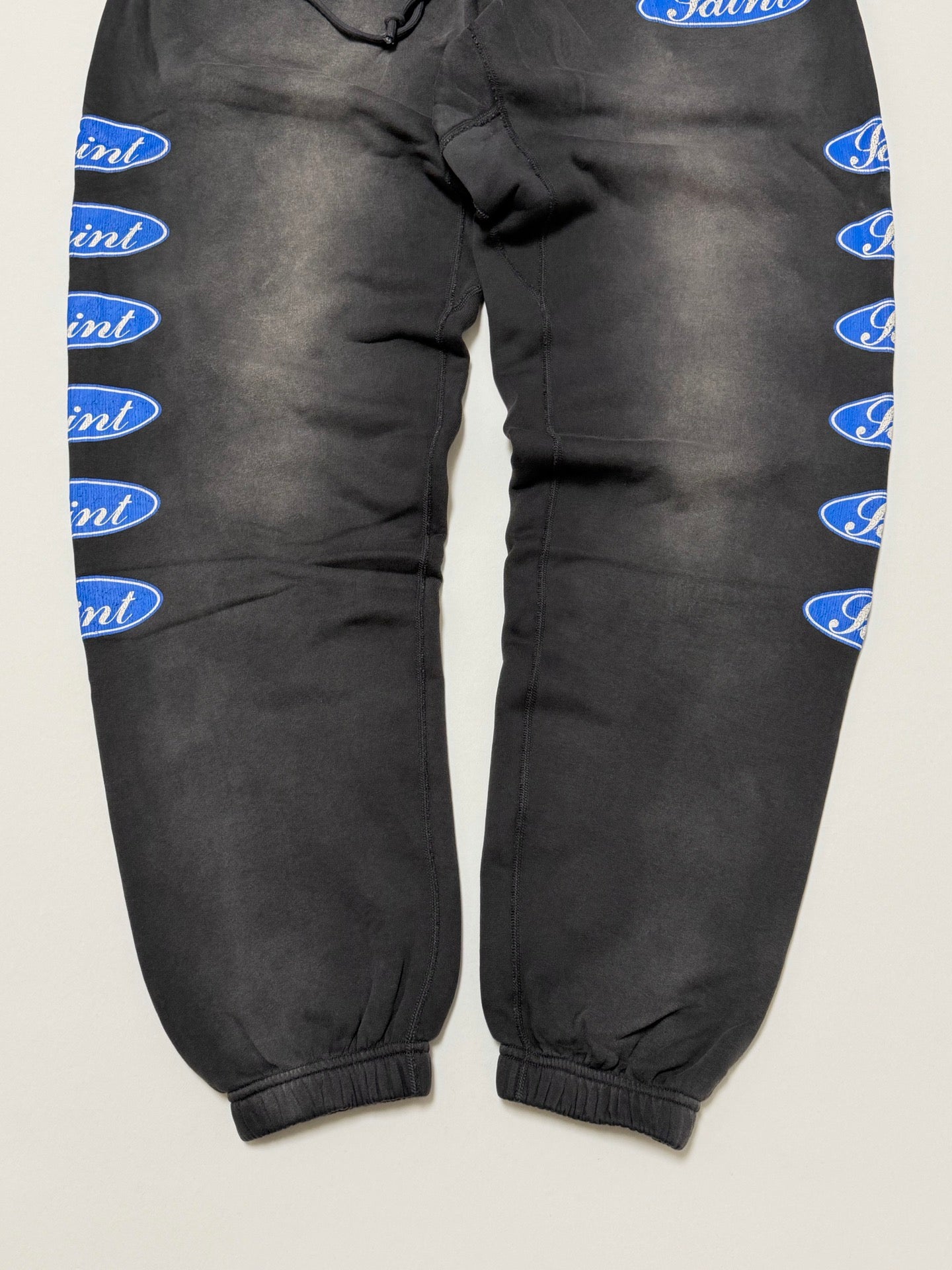 SAINT Mxxxxxx SWEAT PANTS/LOVE AMONG/BLACK