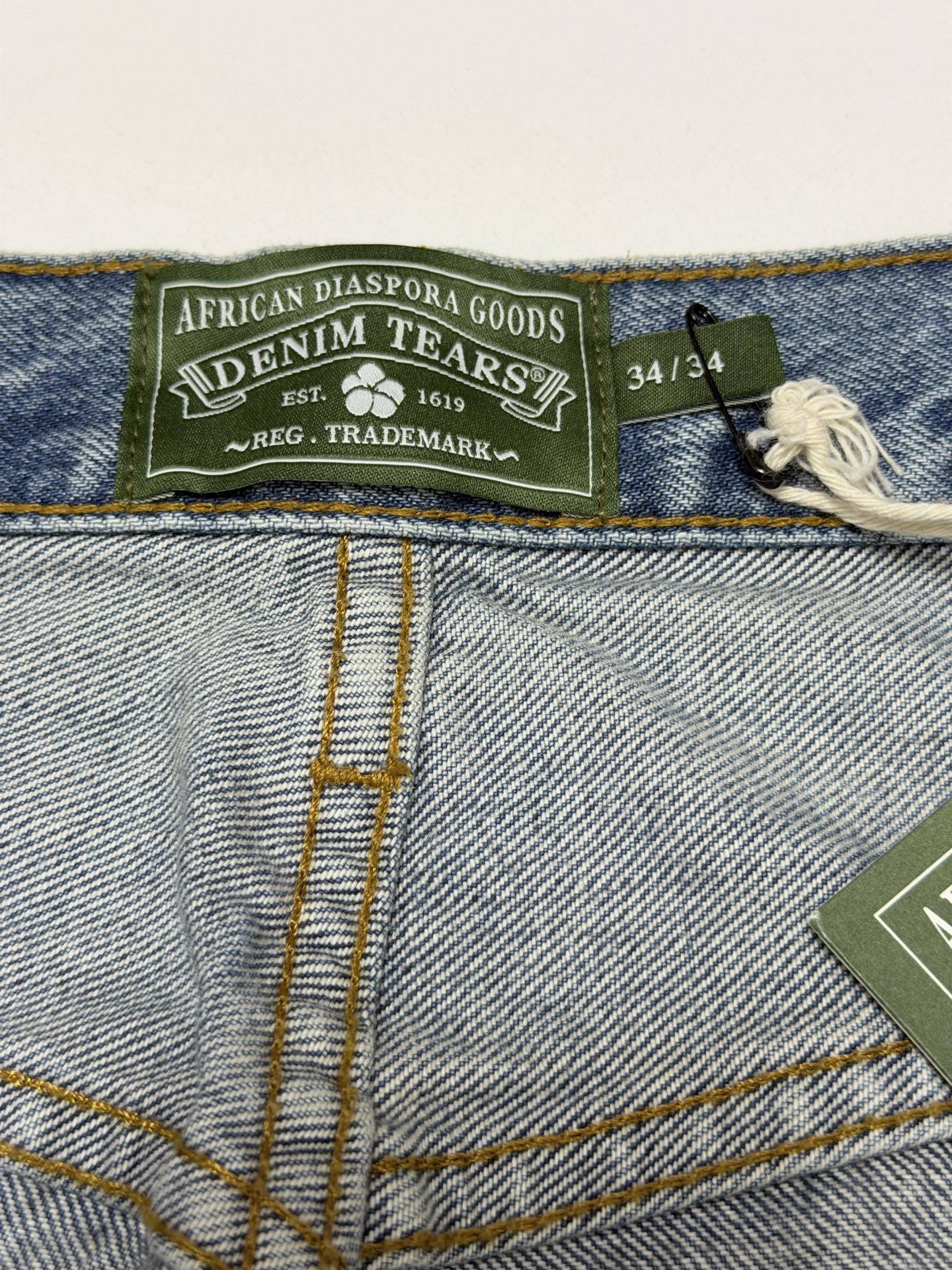 DENIM TEARS / BAGGY COTTON WREATH DENIM PANT